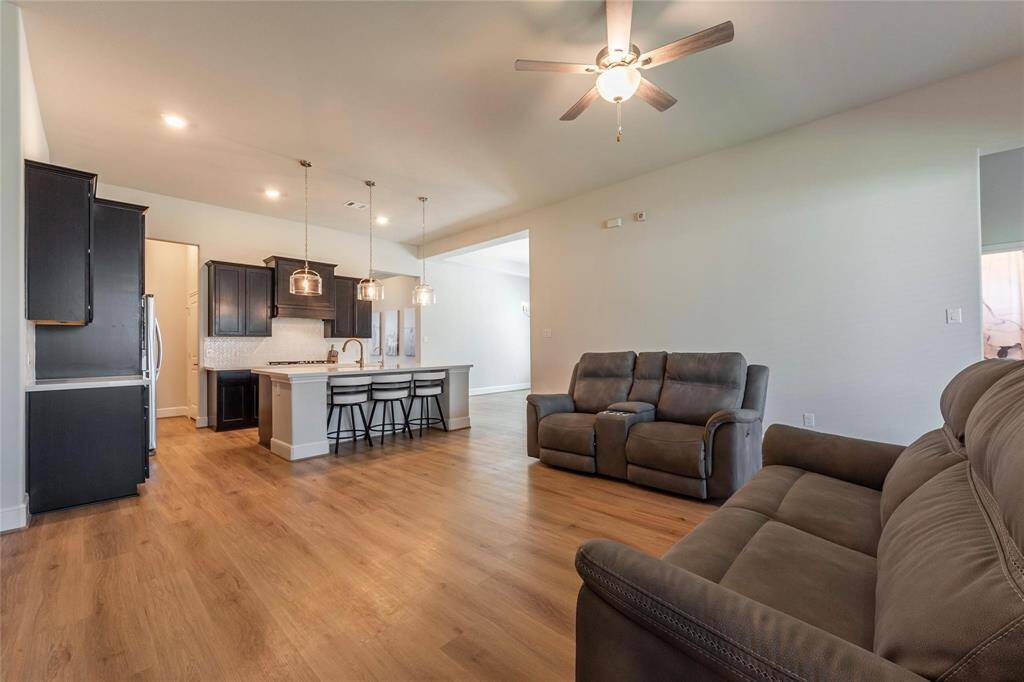 Another view of the open concept living and kitchen area.