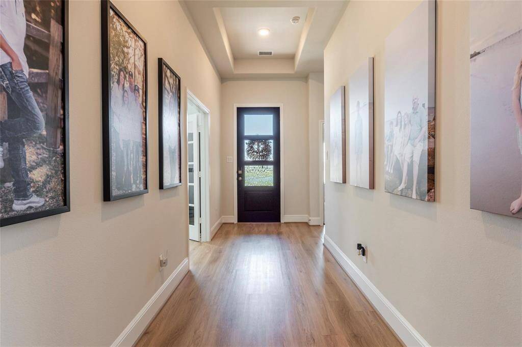 Another view of the entryway coffered ceiling and neutral paint tones.