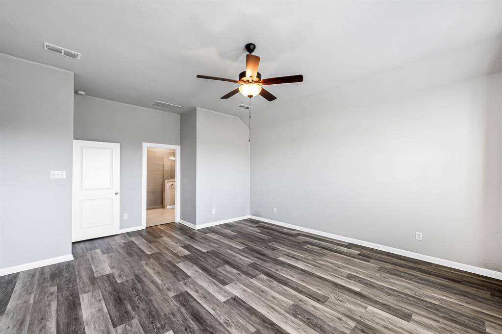 Another view of the extended primary bedroom with plenty of room for all of your furniture.