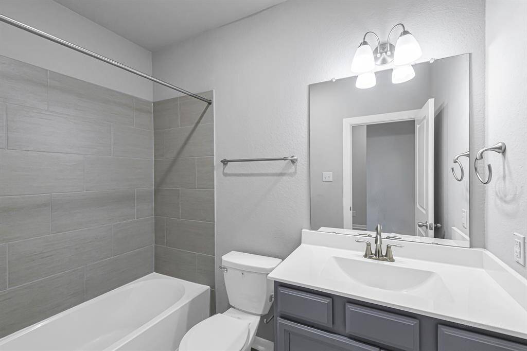 2nd bath located between the secondary bedrooms