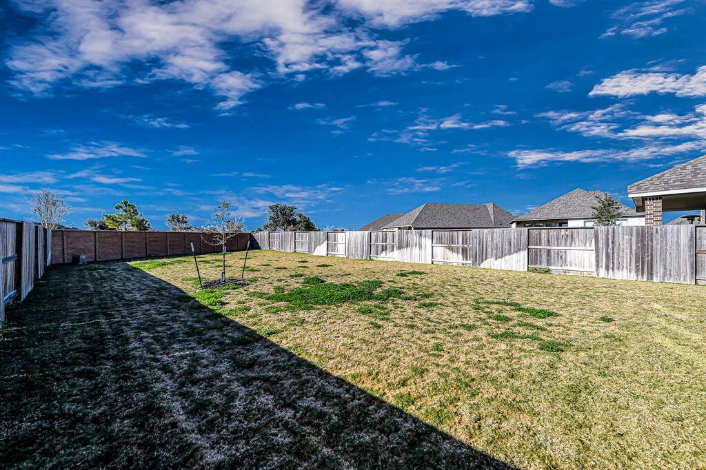This backyard is HUGE! There is plenty of room to add the pool of your dreams!