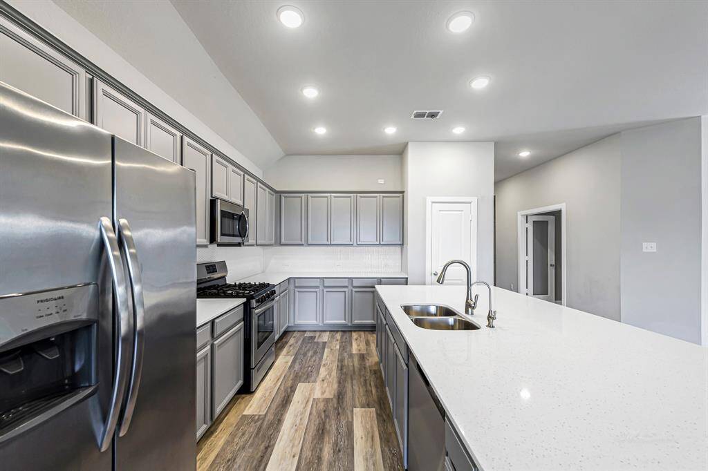 As an added bonus, the refrigerator stays with the home and the dishwasher is brand new!