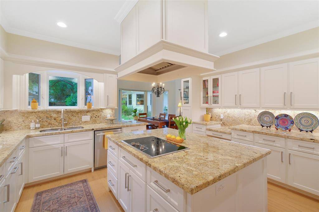Even the Kitchen Sink Window offers a killer view of the resort like backyard pool and patio!