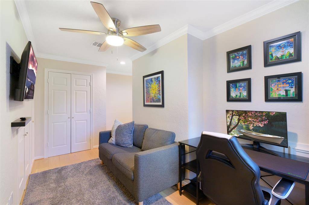 Flex Room upstairs with closet, attic storage, and windows. Make this what you want! Bedroom, hobby room, workout room.