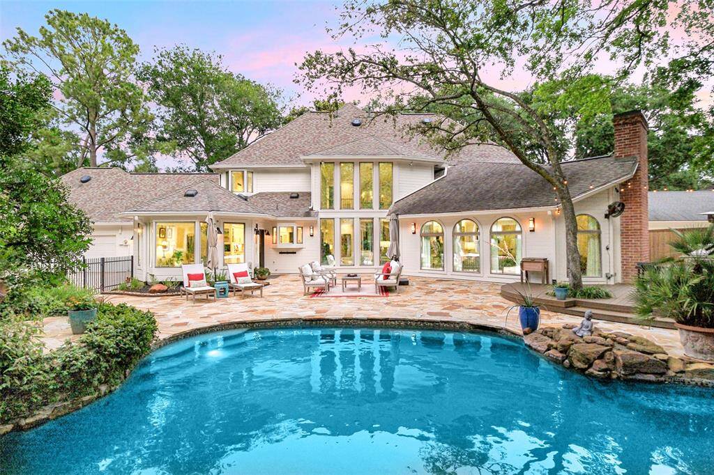 A panoramic view of the exterior of the home. We weren't kidding about the "Walls of Windows".....Magnificent!
