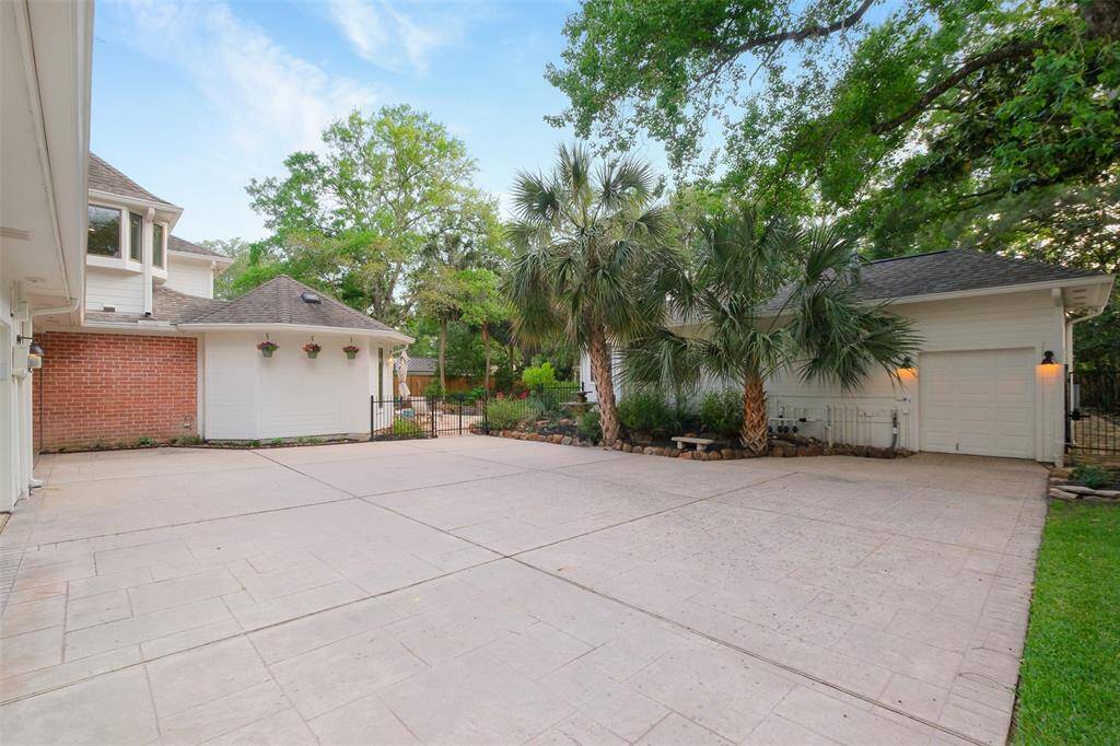 Golf Cart garage and an abundance of parking outside of the 3 car garage!