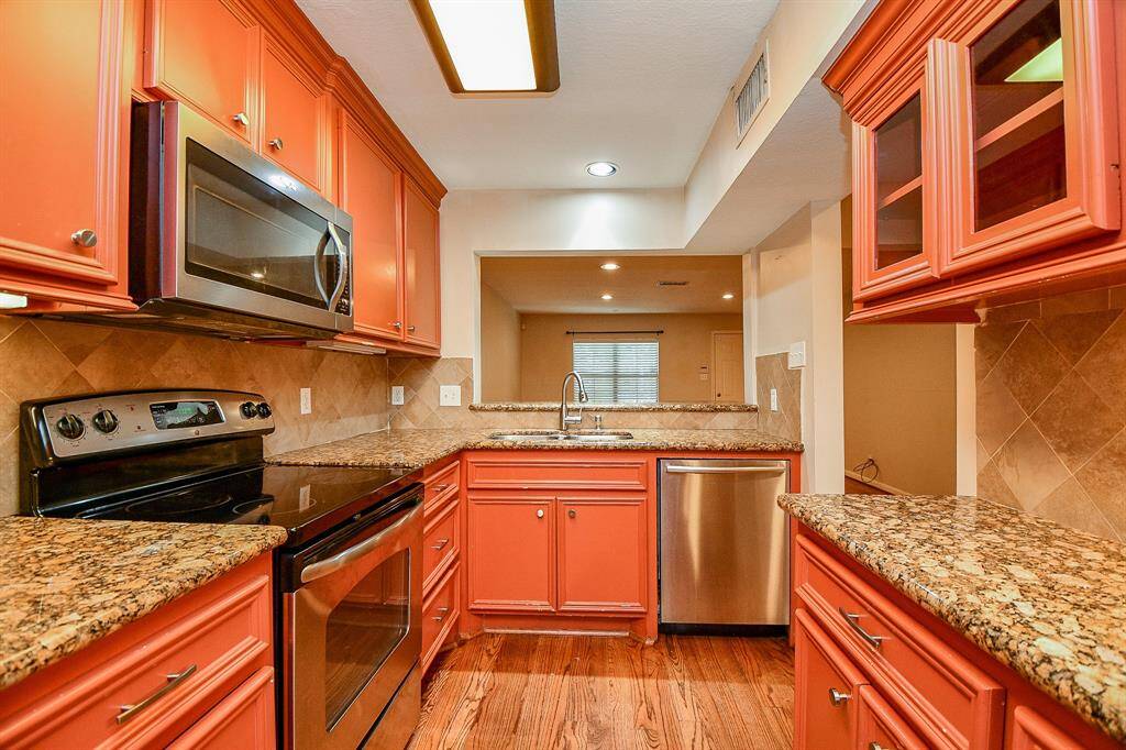 This home features a convenient butler's pantry for additional storage and prep space, enhancing your kitchen experience.