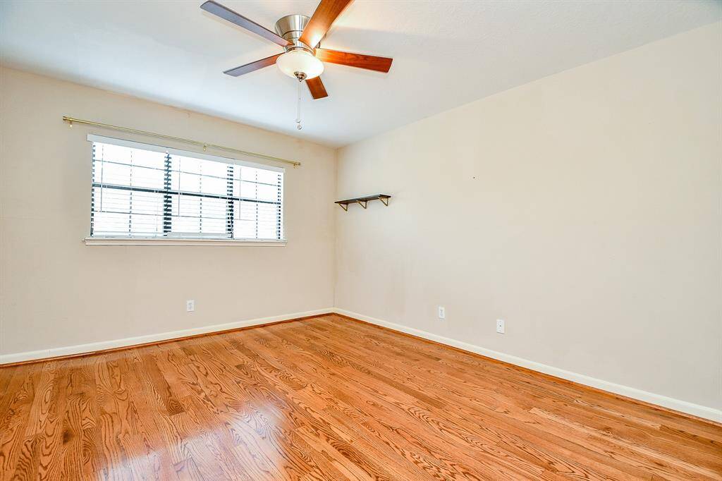 Secondary bedroom with walk-in closet.
