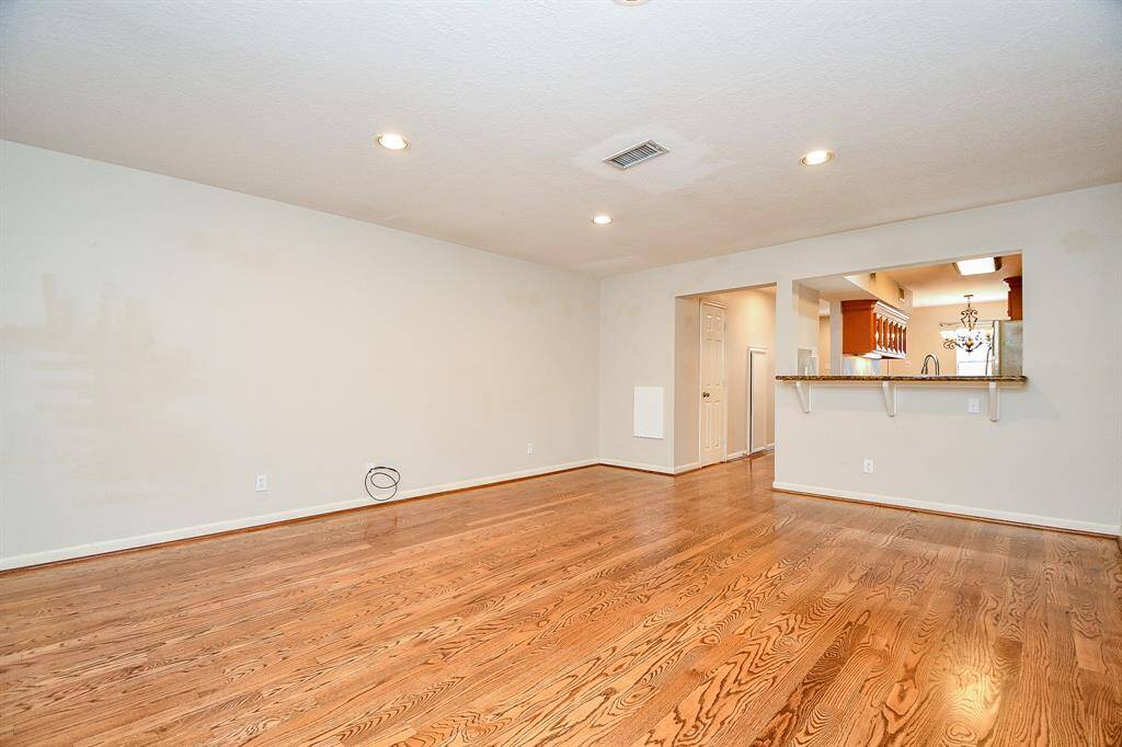 Elegant wood floors enhance the entire space!