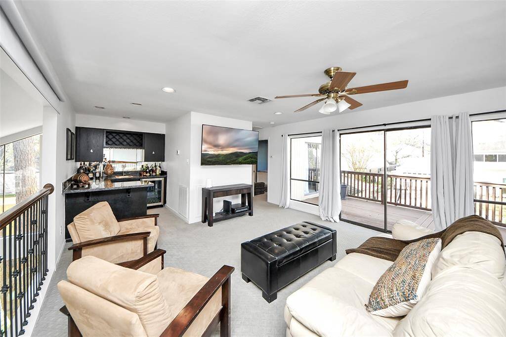 Entertain both indoors and outdoors with the adjoining upstairs deck!