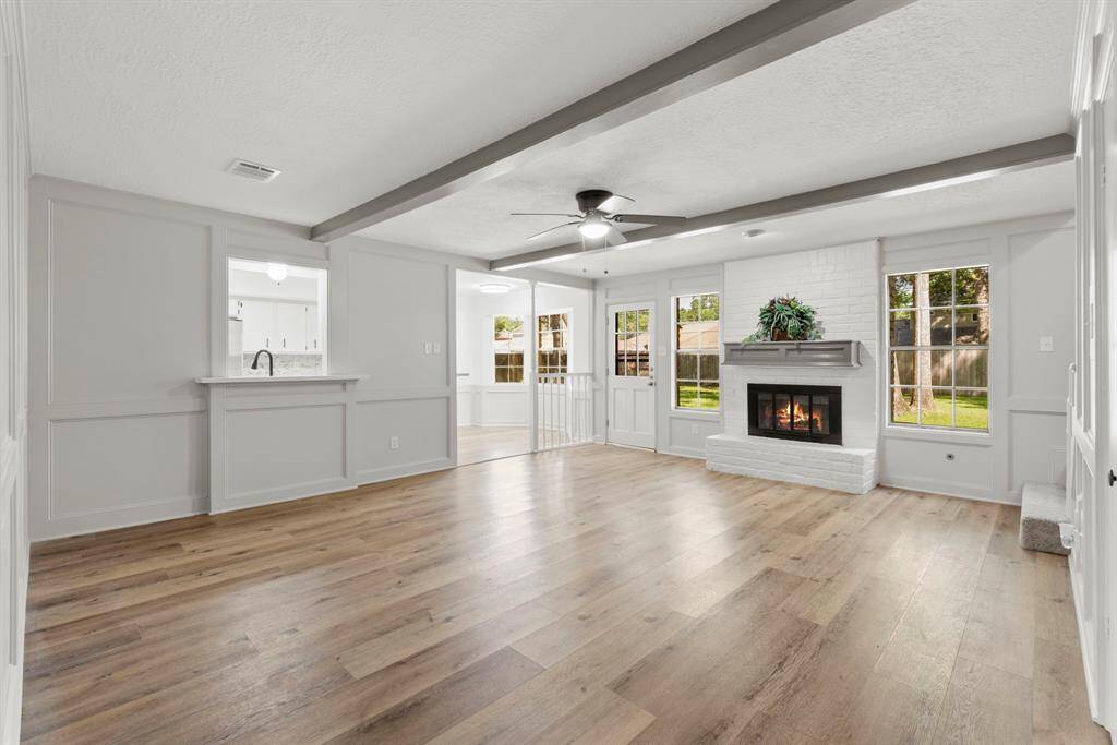 From the entry, if you walk straight forward you will be in this oversized family room! Recently installed LVP floors throughout entire first floor! Neutral paint throughout. Gas fire place, family room open to kitchen.