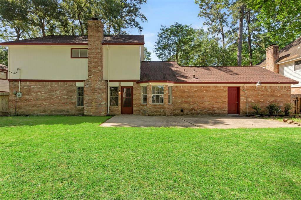 The back of the home has a great patio area! Fresh exterior paint!