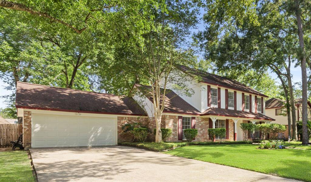 This double wide driveway leads to a two car attached garage with extra storage space!
