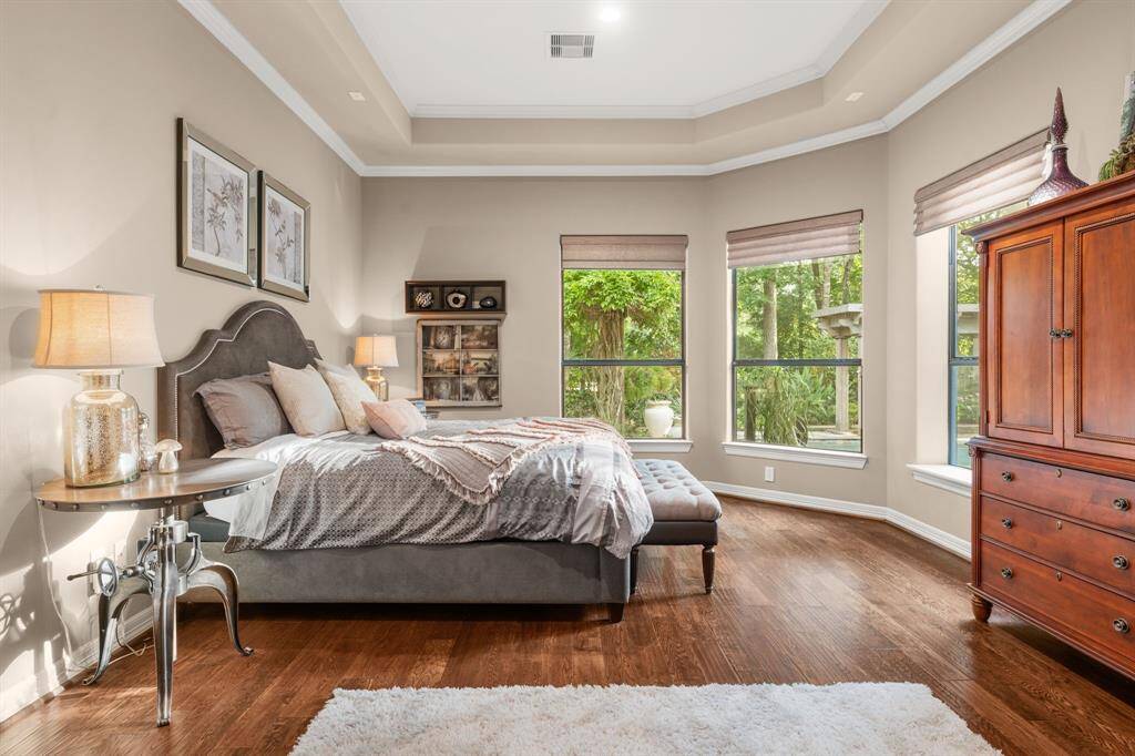 The primary retreat is just that....a retreat!  Imagine laying in bed to this in the morning...so calming.  The ceilings in this room are 11 foot.