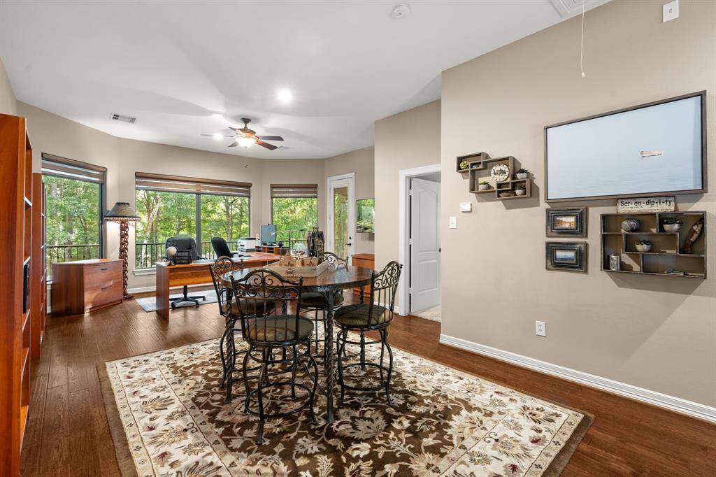This game room is unbelievable with more views to the back gardens and pool!  Wait until you see!  The room offers 10 foot ceilings.