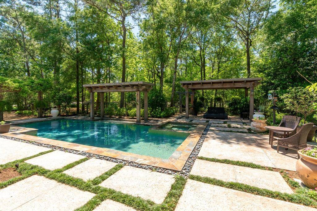 The yard was landscaped for privacy and it delivers! There are seating areas throughout.