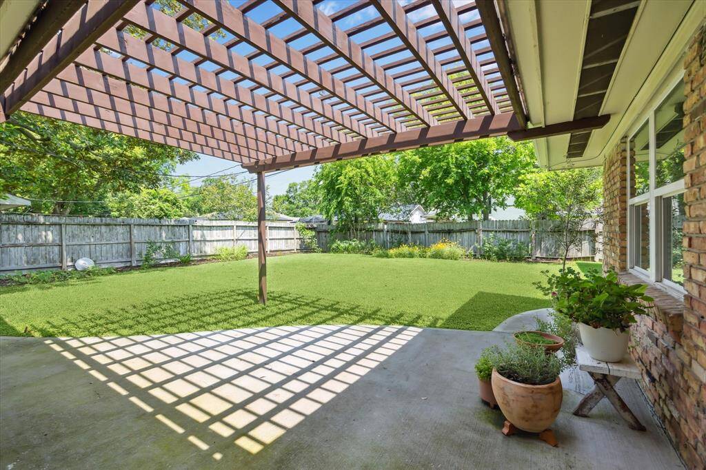 Relax or dine on the patio with the yard with great space for play and a pool.