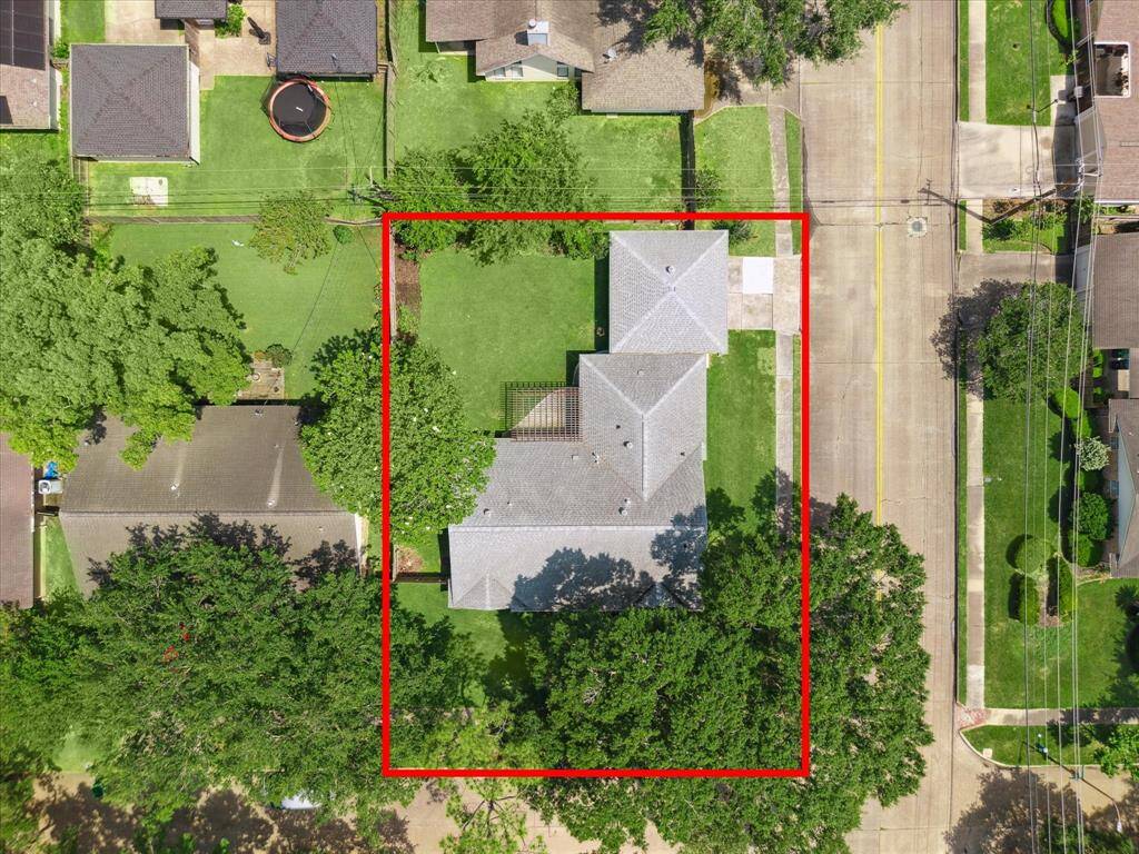 Aerial view directly over the home and garage.