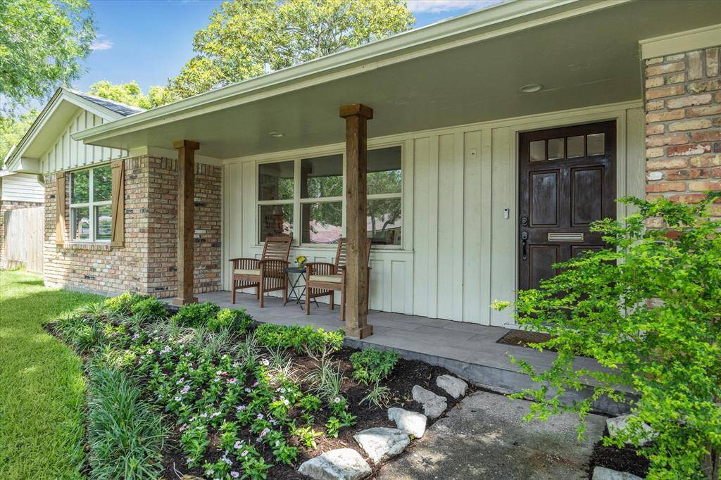Close up of the inviting front porch, note the low e energy saving vinyl windows.
