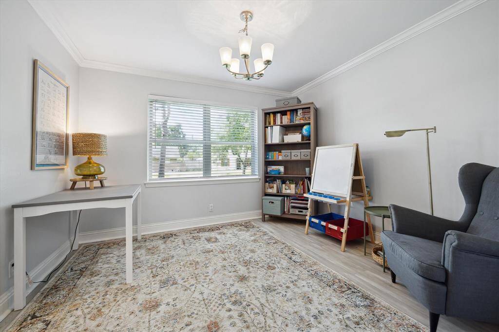 Originally intended as a dining room, these owners used the front facing room as a study/play area.