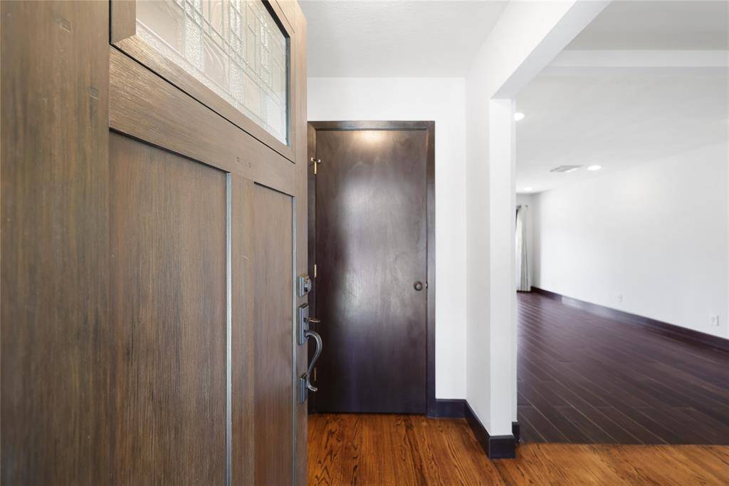Welcoming entryway leading to a bright, open-concept living space.