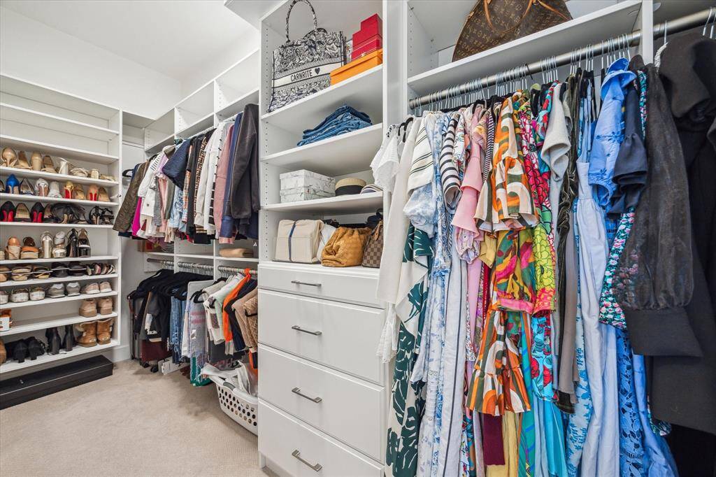One of the two primary closets was custom built for utmost functionality.