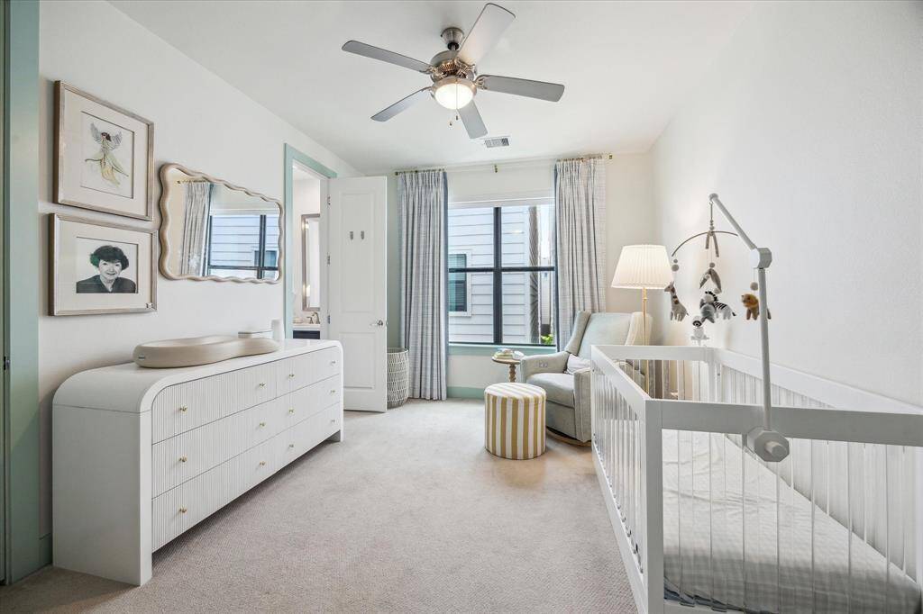 A view of the second bedroom currently being used as a nursery.