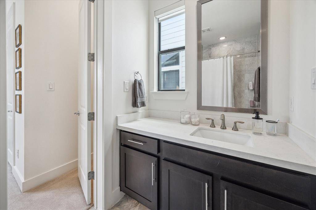 The jack & jill bathroom connecting bedroom 2 & 3.