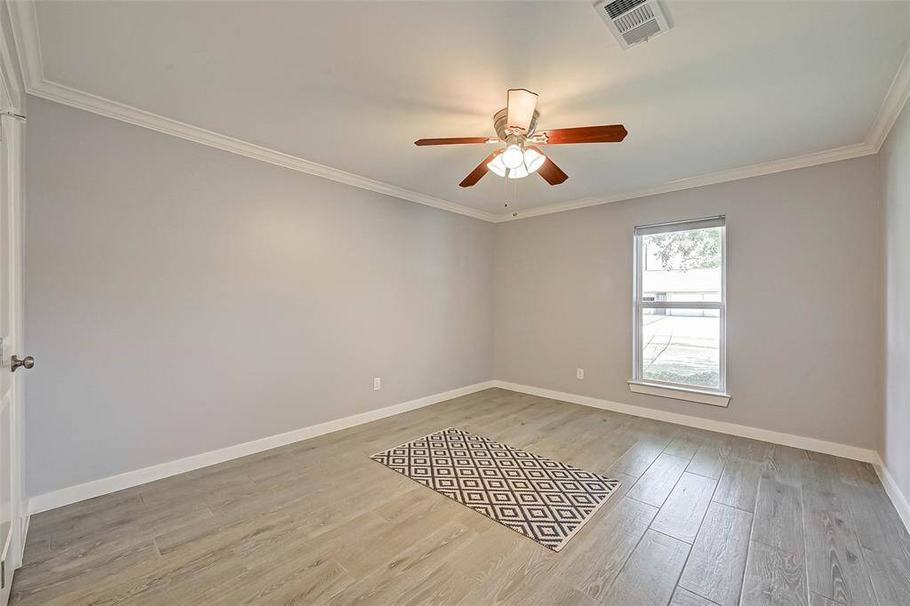 This is the third bedroom also facing the front of this lovely home. Both bedrooms are side by side.