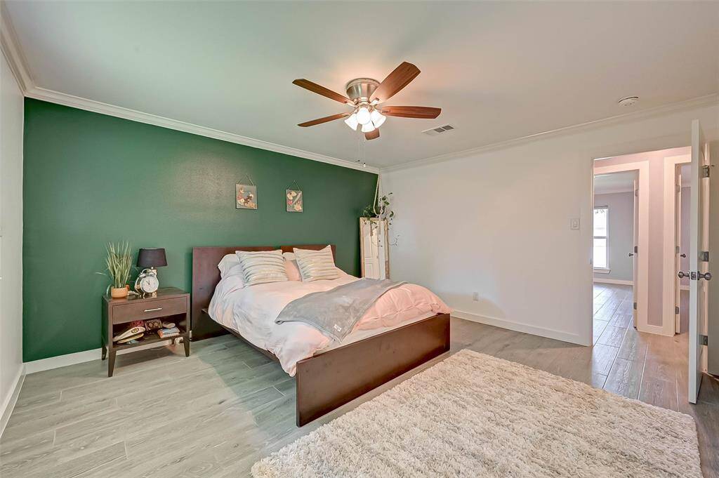 Another view of this spacious Primary suite updated looks an feels new.  GREEN WALL HAS BEEN PAINTED NEUTURAL COLOR
