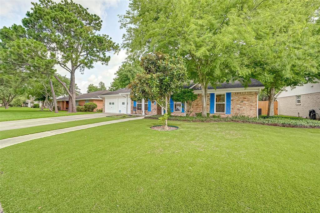 This home sits on a large lot with ample yard space in front artificial grass low maintenance!