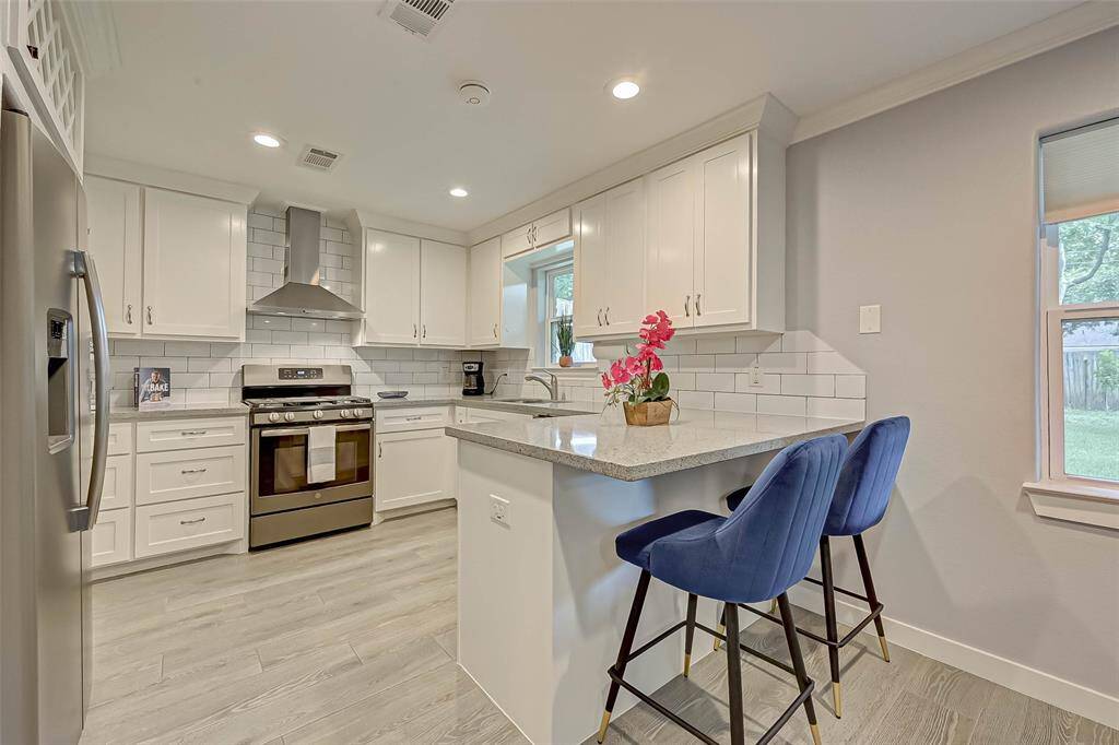 Gather together in good conversation while preparing a fabulous meal in this breathtaking kitchen!