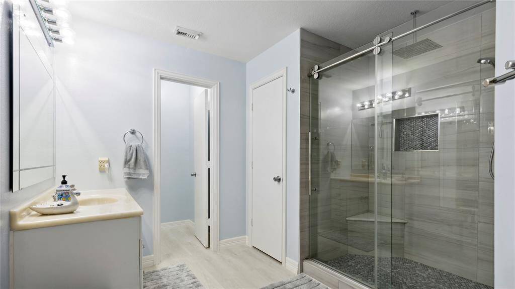 Primary bath with a rain shower