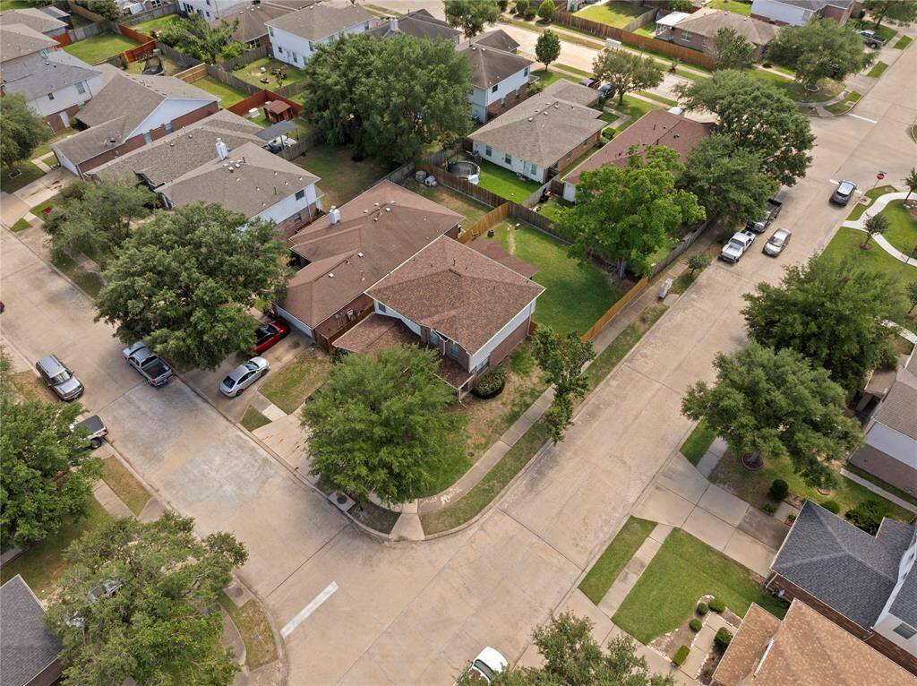 Nice corner lot with huge shade tree.