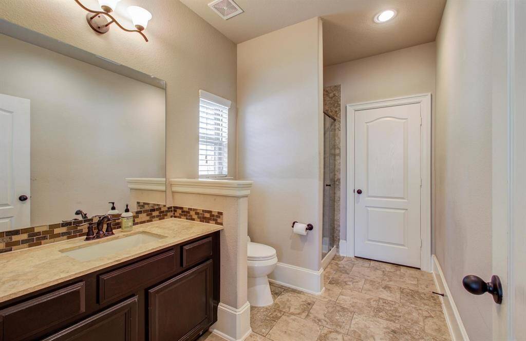 Ensuite Bath connected to the second bedroom downstairs.
