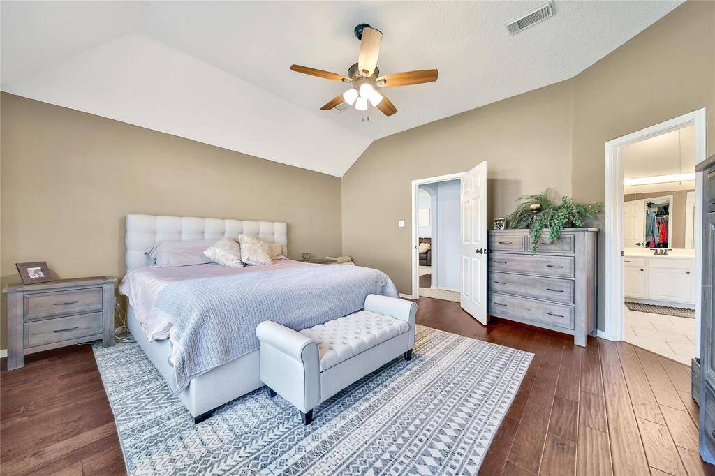 Primary Suite offers natural light, ensuite bath with dual sinks, separate vanities, soaking tub and stand alone shower with adjoining walk-in closet