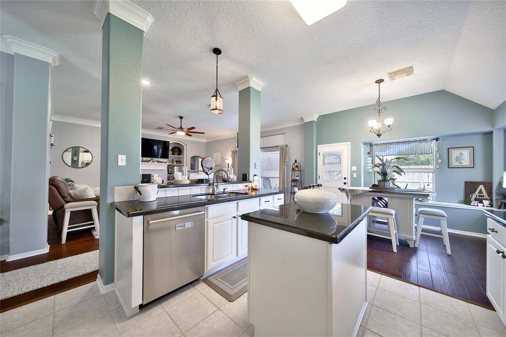 WOW! Such a beautiful home. Notice the window seating in the breakfast nook along the windows!