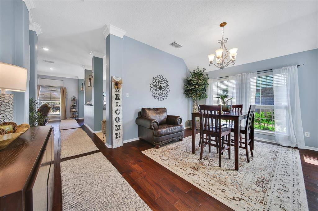 With elevated ceilings, triple crown molding and wood work throughout this home feels spacious, classic and cozy.