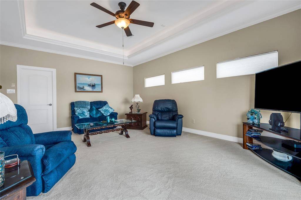 This spacious game room can serve as multiple needs.