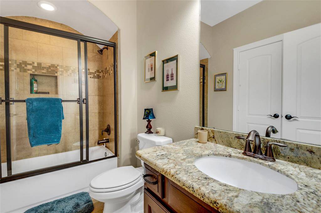 Upstairs bathroom serves the upstairs guest bedroom as well as the game room.