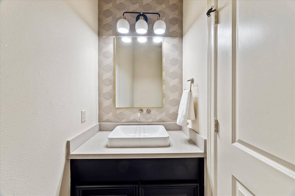 Half bath located on 2nd floor is directly off the flex space previously pictured.