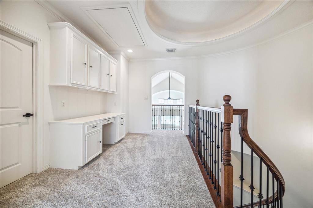 Landing space on the 3rd floor is a great study spot complete with built-in desk.