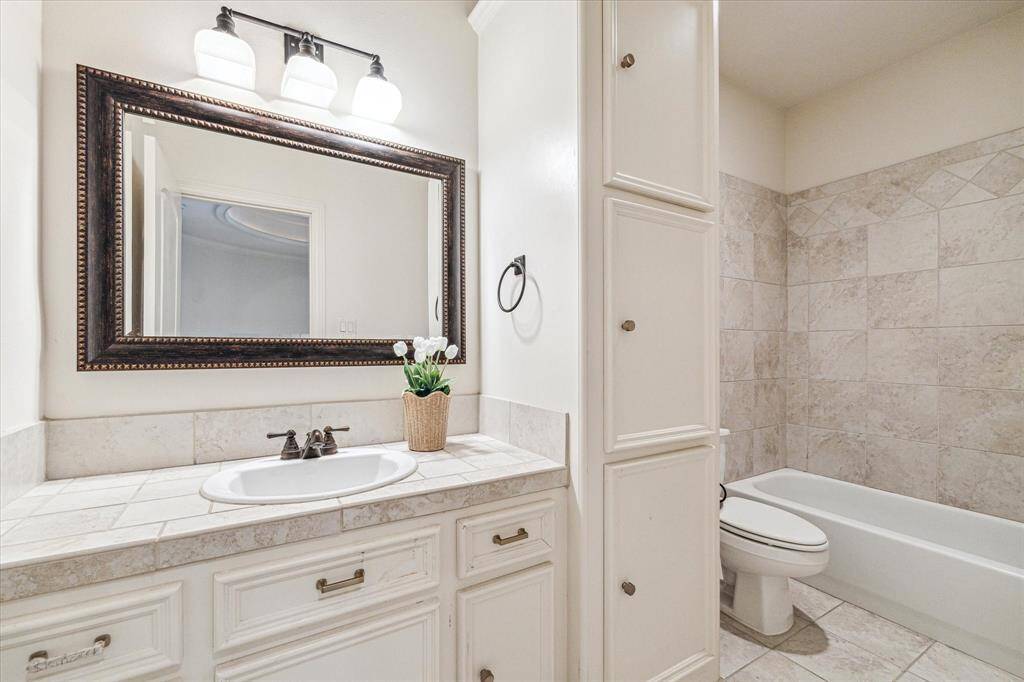 Full bathroom located on 3rd floor to be shared by the two secondary bedrooms.