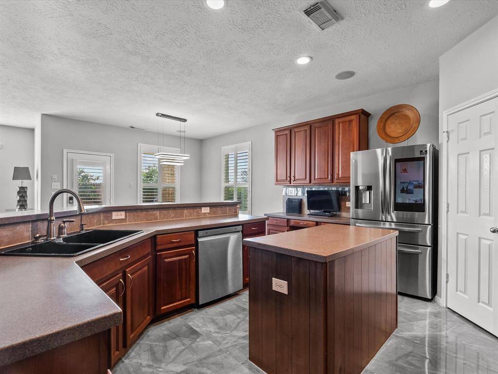 Island kitchen with walk in pantry and LG dishwasher