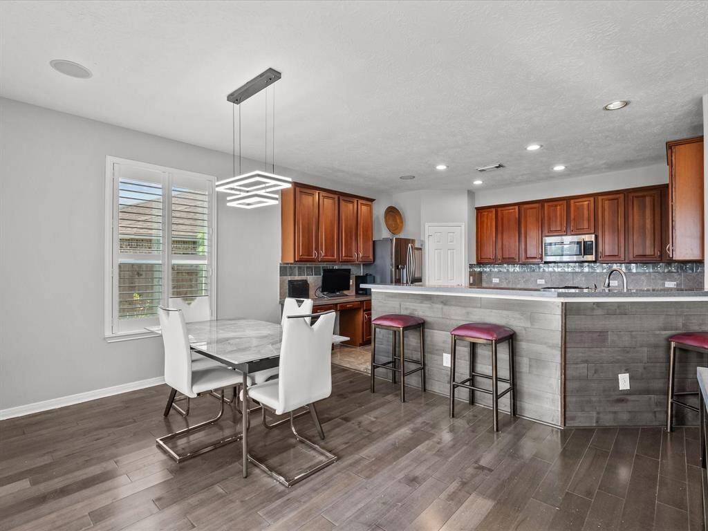 Bright breakfast room open to living area