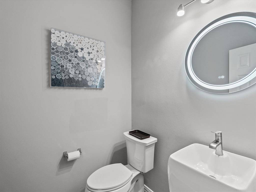 Updated modern half guest bath downstairs
