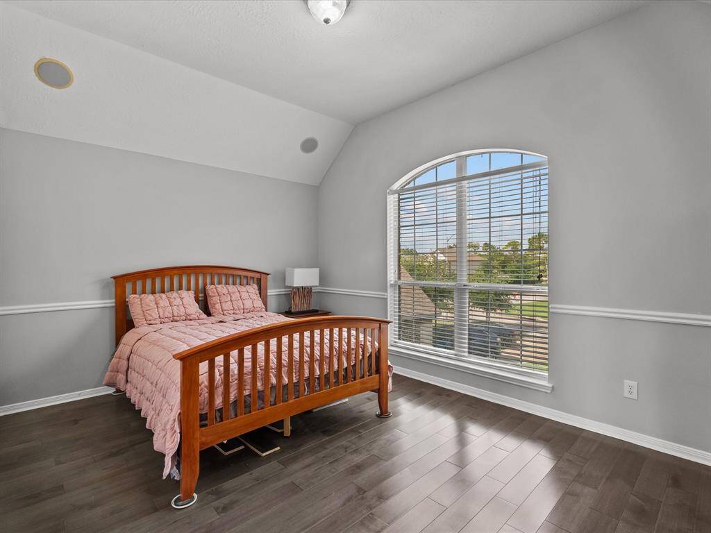 Split upstairs floor plan offers added privacy, with one secondary bedroom set apart from the others.