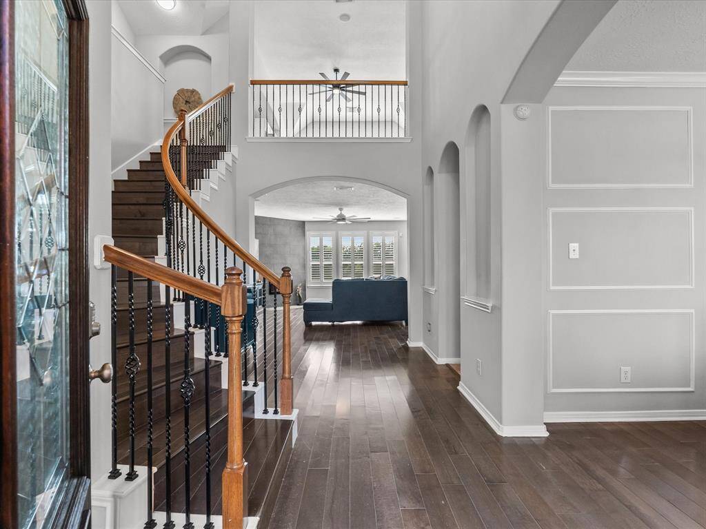 High Ceilings & Hardwood Floors Throughout