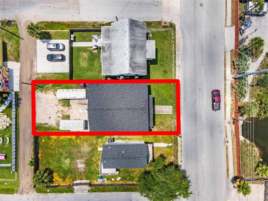 Aerial View Showing Lot Boundaries & Parking Access Off Alley Behind the Home