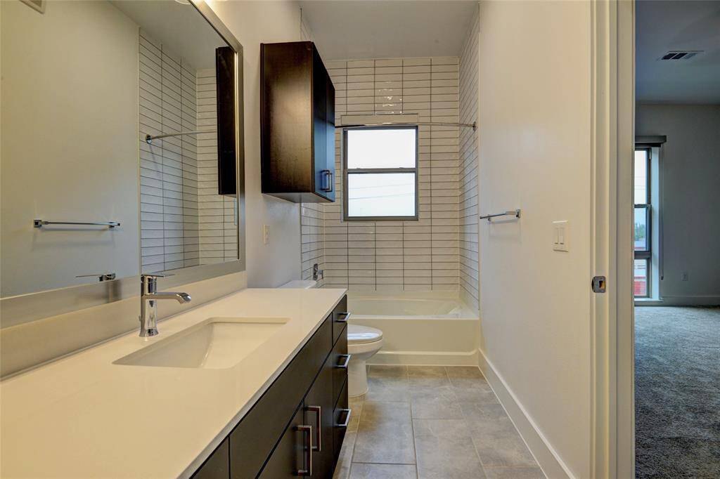 Primary bathroom with dual sinks.